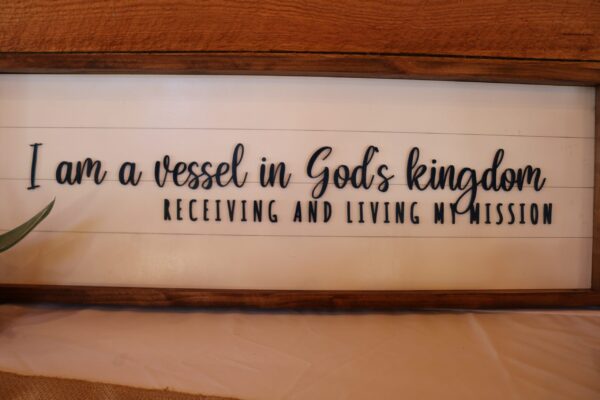 sign with words, "I am a vessel in God's kingdom, receiving and living my mission"